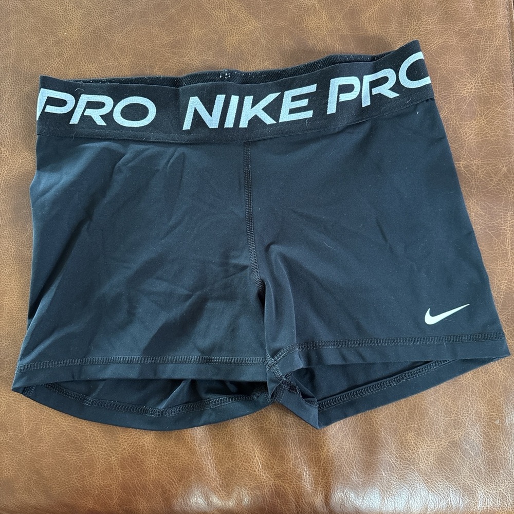 Nike Pro Women's Black Athletic Compression Shorts with White Logo